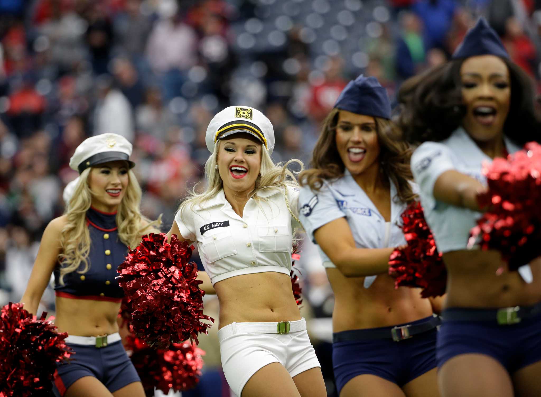 Houston Texans cheerleaders wearing salute to service uniforms perform  during an NFL football game against the New York Jets, Sunday, Nov. 28, 2021,  in Houston. (AP Photo/Matt Patterson Stock Photo - Alamy