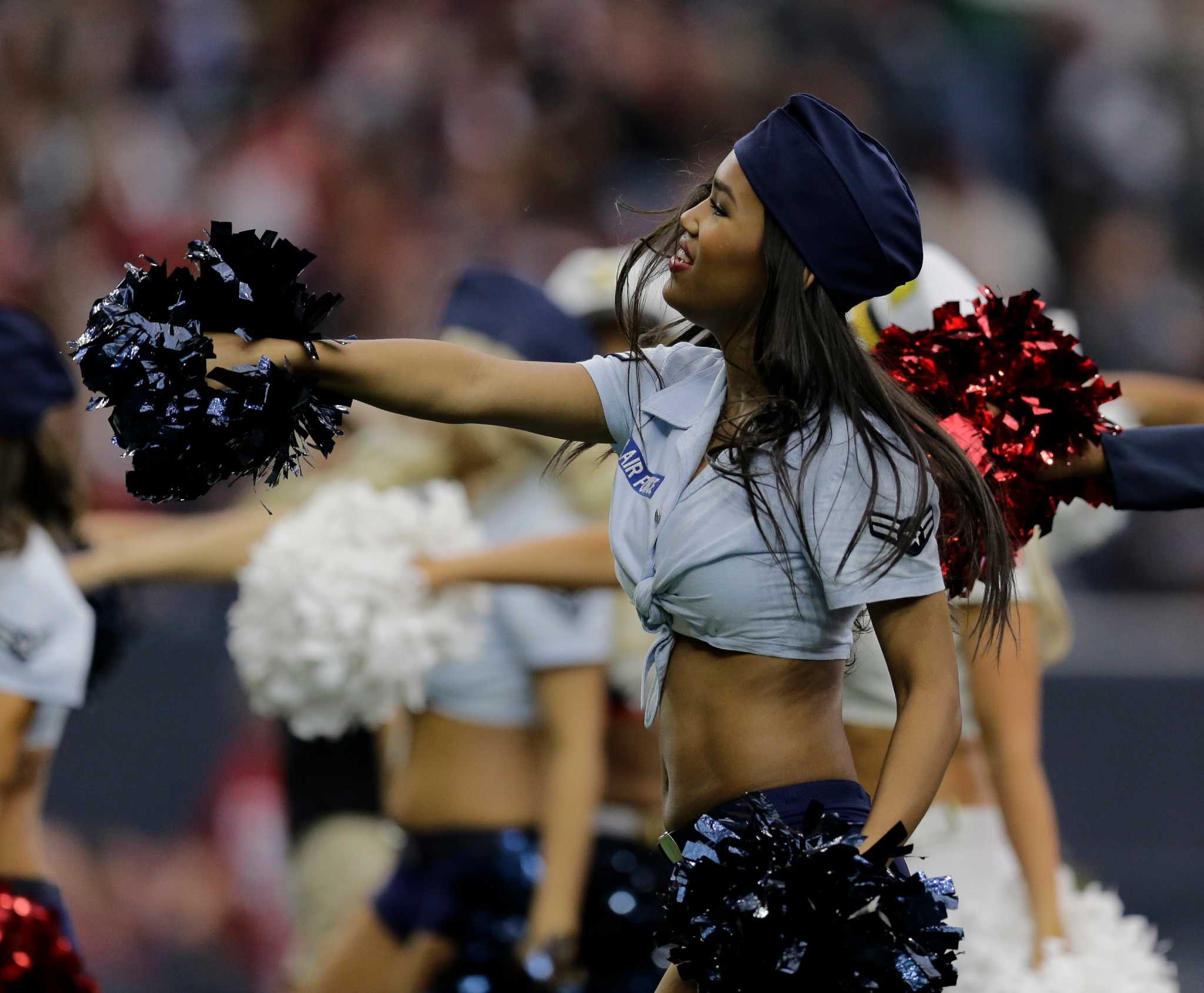 Texans cheerleaders salute the military