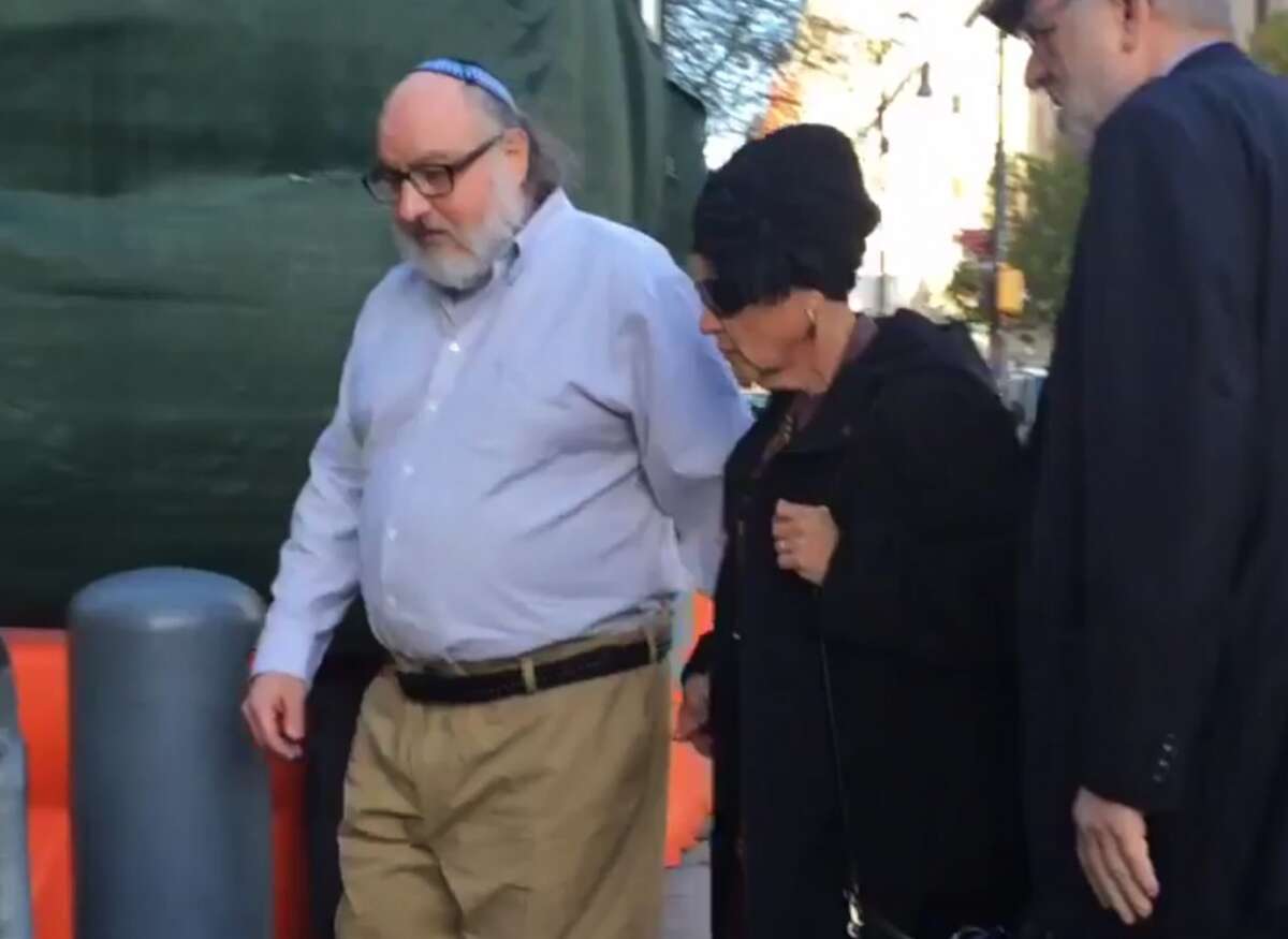 CLICK AHEAD to see alleged spies in history. Convicted spy Jonathan Pollard, left, arrives at a federal courthouse in New York with his wife, Esther, to check in at a probation office just hours after he was released from prison on Friday, Nov. 20, 2015. Pollard's release was the culmination of an extraordinary espionage case that complicated American-Israeli relations for 30 years and became a periodic bargaining chip between two allies. (Ilana Gold/WCBS-TV via AP)