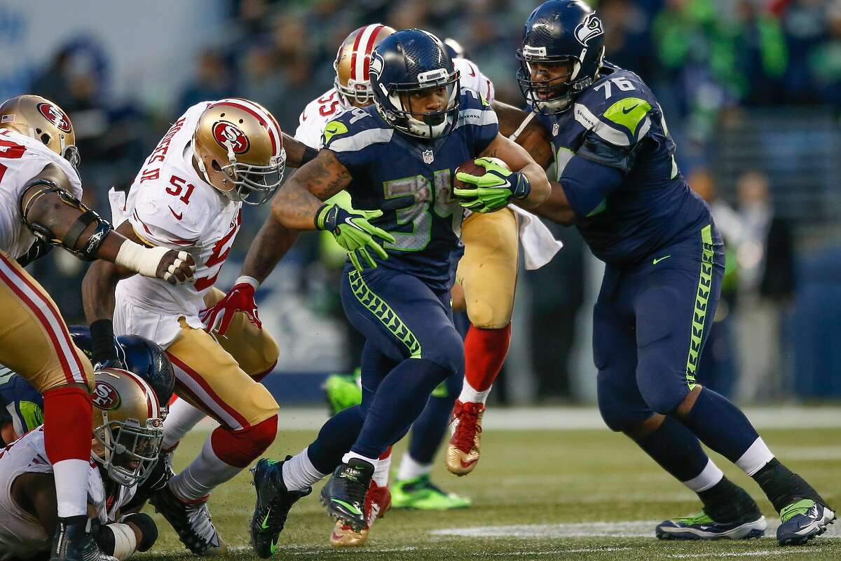 SEATTLE, WA - NOVEMBER 22: Running back Thomas Rawls #34 of the Seattle Seahawks rushes against the San Francisco 49ers at CenturyLink Field on November 22, 2015 in Seattle, Washington. The Seahawks defeated the 49ers 29-13. (Photo by Otto Greule Jr/Getty Images)