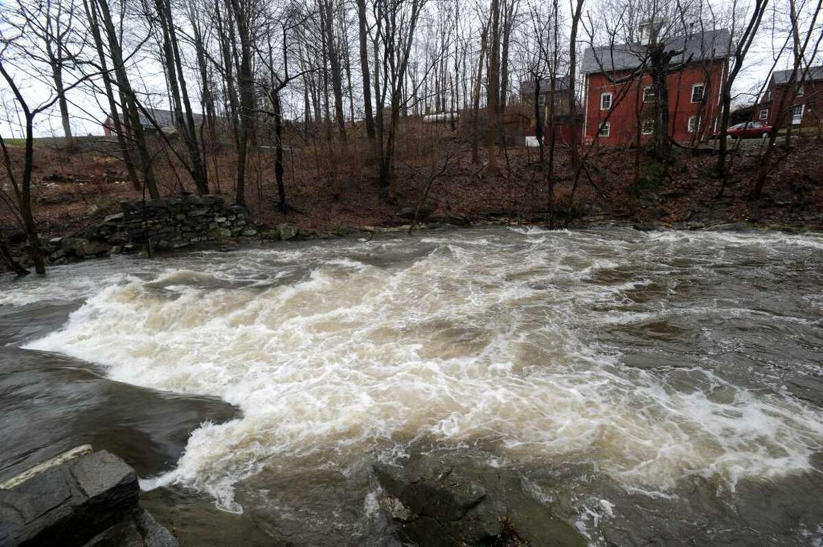 The Still River near the Four Corners in Brookfield is raging due to the recent heavy rains, Tuesday, March 30, 2010.