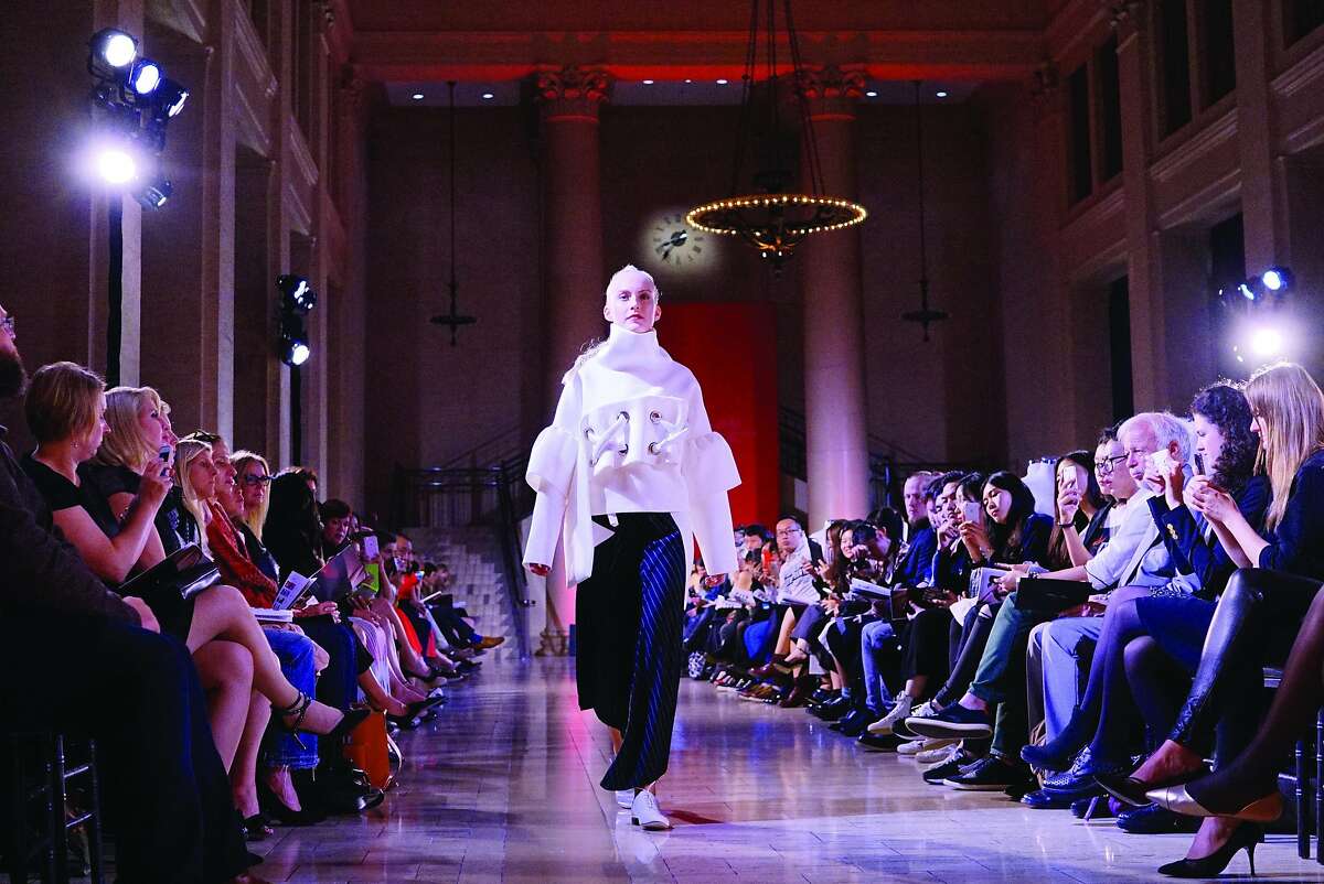 American designer Myra Chung of Harper college showed architectural dresses inspired by blueprints during the Arts of Fashion runway shows Oct. 27 at the Bently Reserve. Photo by Rommi Linnik