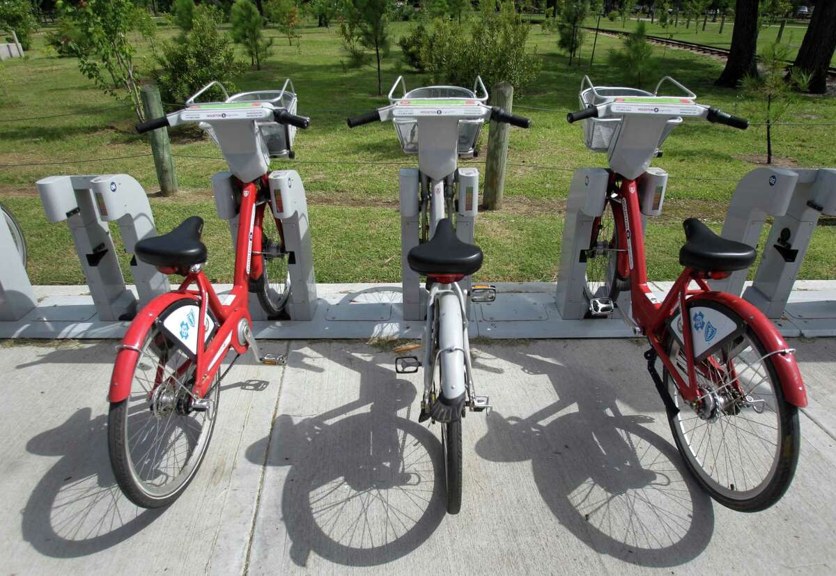 A B-Cycle location near the Houston Zoo at Hermann Park Lake Plaza, 6100 Hermann Park Drive, is shown July 11, 2014. The zoo location is the city's most popular spot for picking up the recognizable bikes. ( Melissa Phillip / Houston Chronicle )
