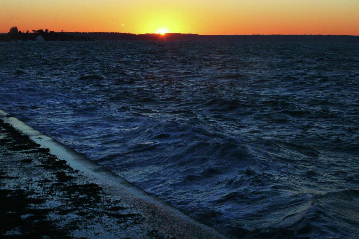 King tides crash on Alki Beach