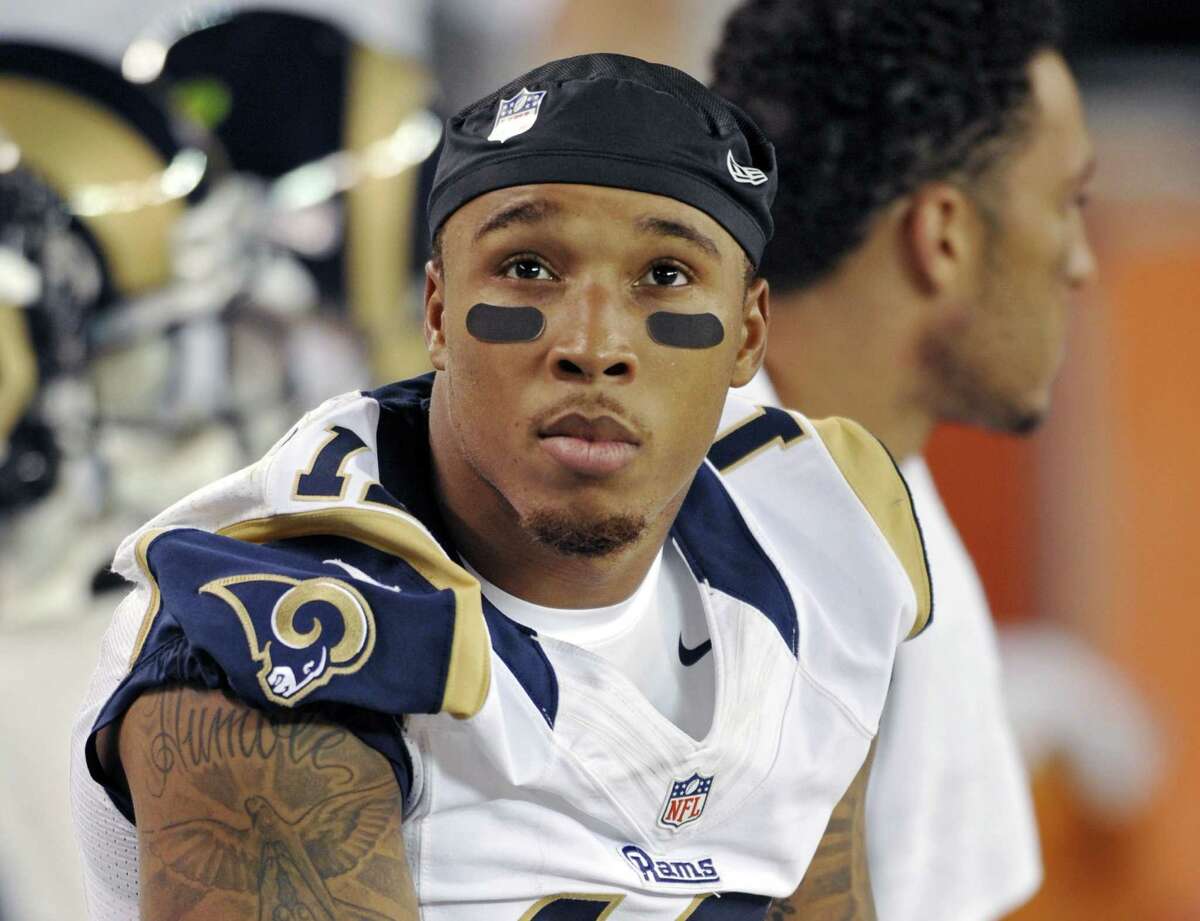 FILE - This Aug. 8, 2013, file photo shows St. Louis Rams wide receiver Stedman Bailey watching from the bench in the fourth quarter of a preseason NFL football game against the Cleveland Browns, in Cleveland. Suspended Rams wide receiver Stedman Bailey was shot and critically wounded as he and four other people were sitting in a car outside a home in the Miami area, police said Wednesday, Nov. 25, 2015. Bailey was at a hospital awaiting surgery for injuries that have not been disclosed by the Rams or the authorities. (AP Photo/David Richard, File)
