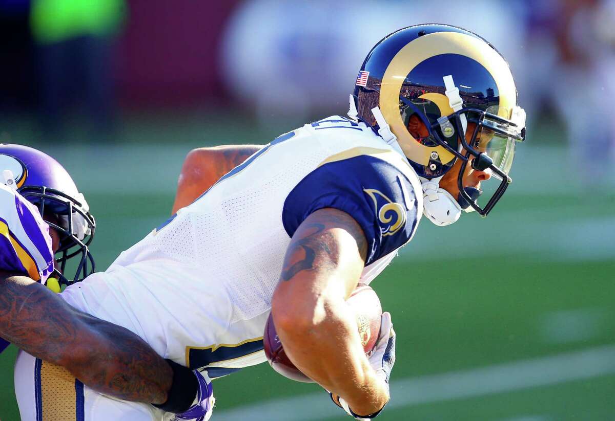 St. Louis Rams wide receiver Stedman Bailey (12) runs the ball after a catch against the Minnesota Vikings during an NFL football game Sunday, Nov. 8, 2015, in Minneapolis. The Vikings won in overtime, 21-18. (Jeff Haynes/AP Images for Panini)