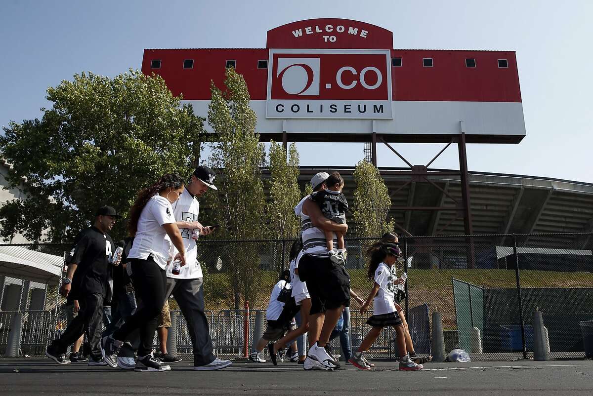 Fans arrive at O.co Coliseum in Oakland.