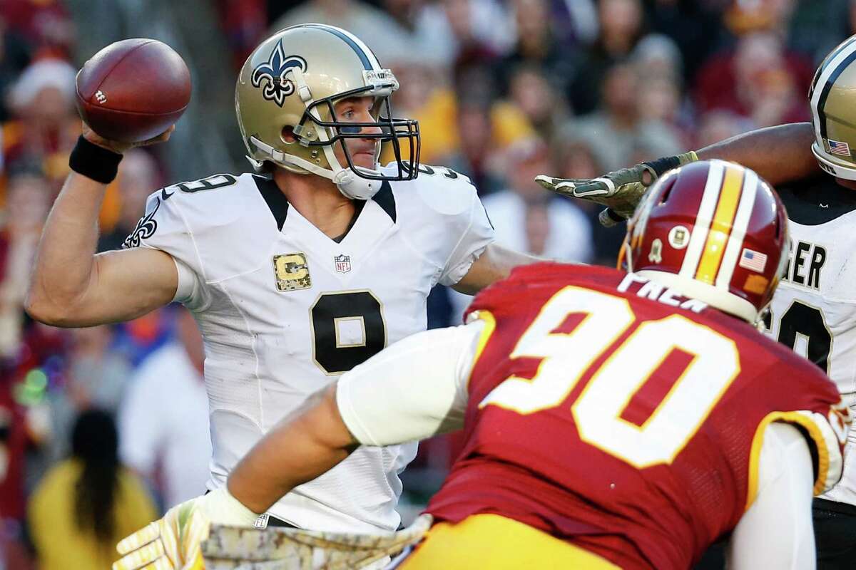 New Orleans Saints quarterback Drew Brees (9) passes the ball during the second half of an NFL football game against the Washington Redskins in Landover, Md., Sunday, Nov. 15, 2015. (AP Photo/Alex Brandon)