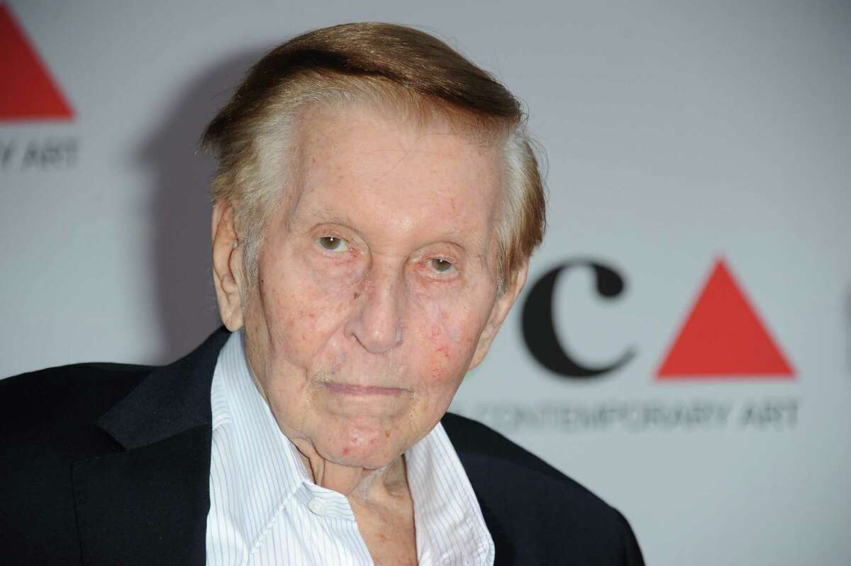 FILE - In this April 20, 2013 file photo, Sumner Redstone arrives at the 2013 MOCA Gala celebrating the opening of the Urs Fischer exhibition at MOCA, in Los Angeles. Attorneys for Redstone and the media mogul's former companion, Manuela Herzer, are locked in a court fight over control of the 92-year-old billionaire's medical care. Herzer contends in court documents filed Wednesday, Nov. 25, 2015, that Redstone is in frail health and lacks the capacity to make decisions, but Redstone's attorneys say those characterizations are lies and he remains in good spirits and able to make informed decisions. (Photo by Richard Shotwell/Invision/AP, File)
