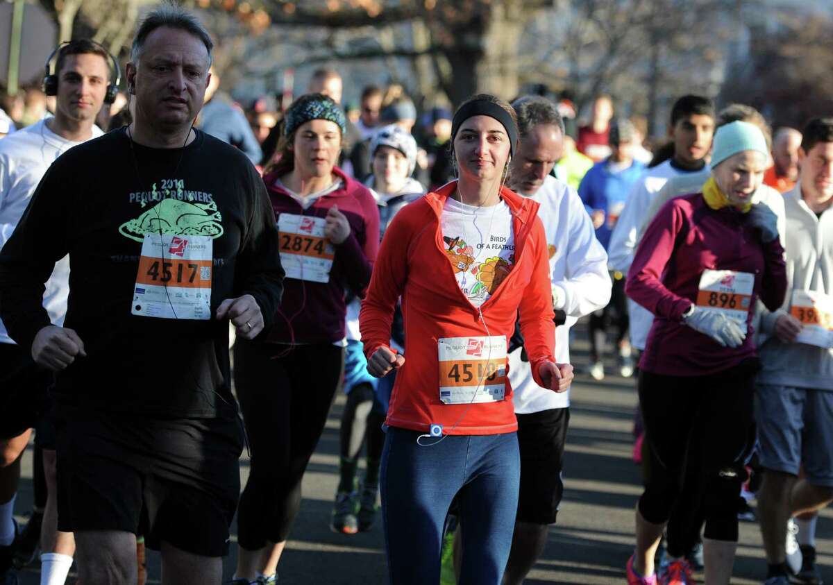 The 38th annual Pequot Runners Thanksgiving Day 5-mile race takes place Thursday, Nov. 26, 2015, in Southport, Conn.