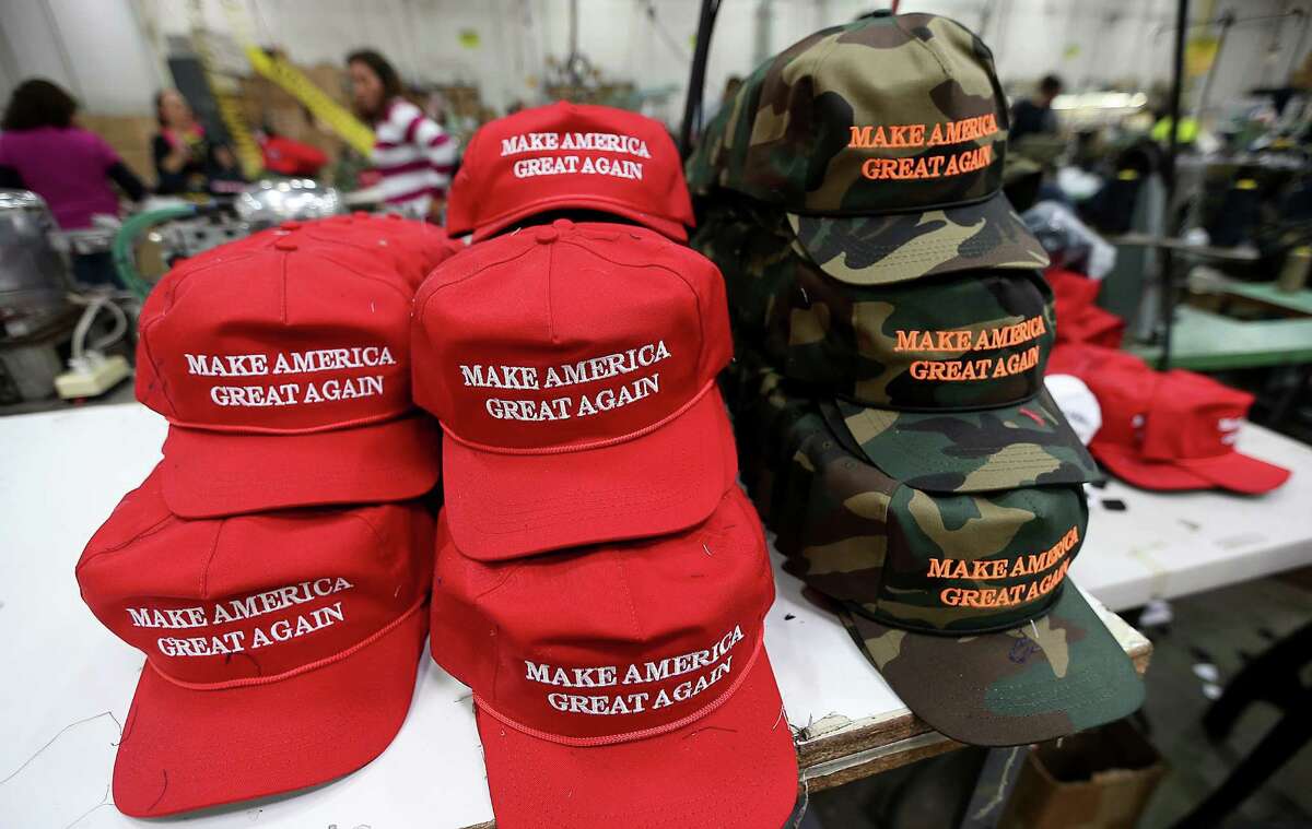 School Bus Conflict Missouri middle school students were disciplined when a fight broke out on a school bus after students argued with a one boy who was wearing following a "Make America Great Again" hat, KMOV reported. The students argued over Trump's proposed Mexican border wall and pushed each other. Pictured: Workers stitch together hats on the factory floor of Cali Fame and Cali Headwear in Carson, Calif. The hat and apparel maker is best known for producing Donald Trump's "Make America Great Again" baseball caps.