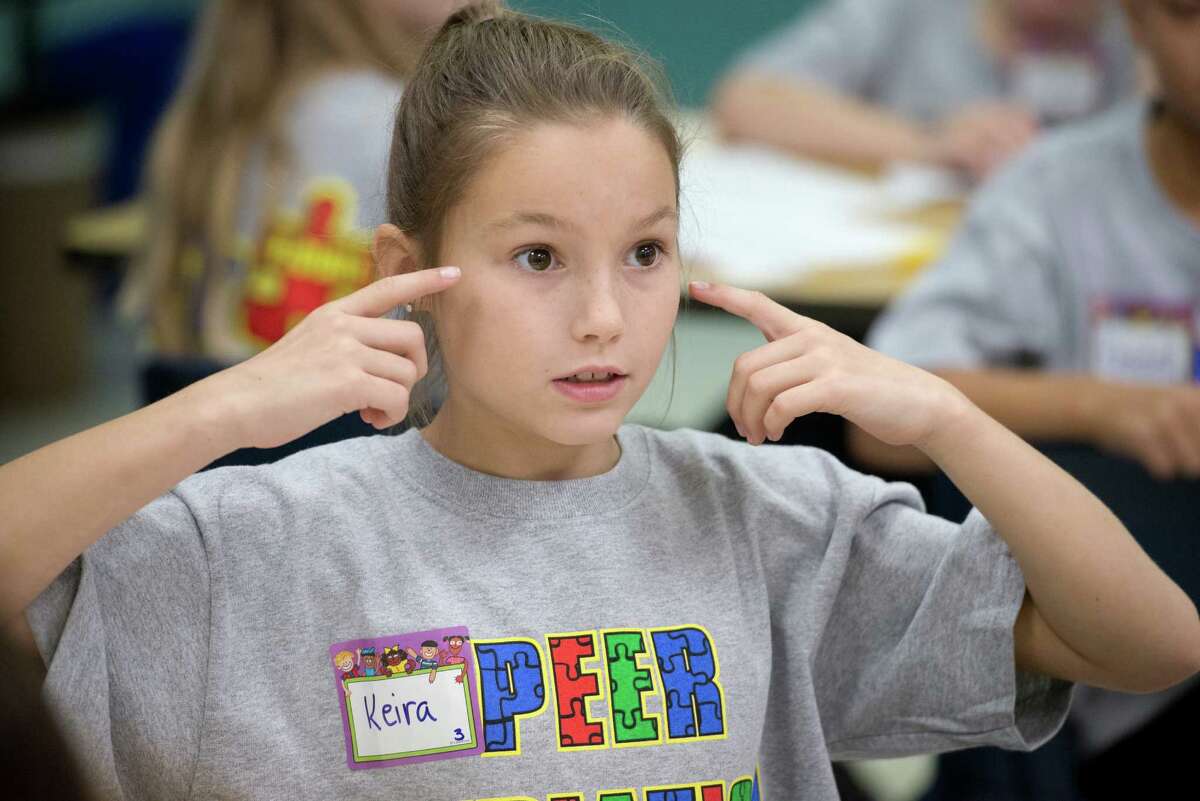 Third-grader Keira Gunn says you have to listen to others with your eyes as well as your ears.