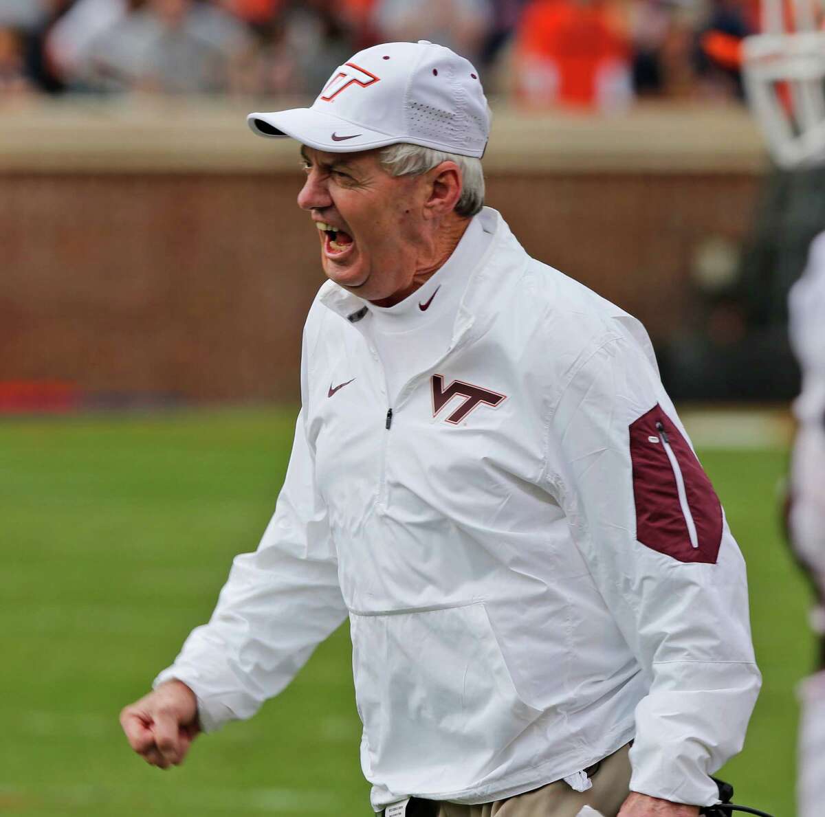 Virginia Tech head coach Frank Beamer directs his players during the second half of an NCAA college football game against Virginia in Charlottesville, Va., Saturday, Nov. 28, 2015. Tech won the game 23-20. (AP Photo/Steve Helber)
