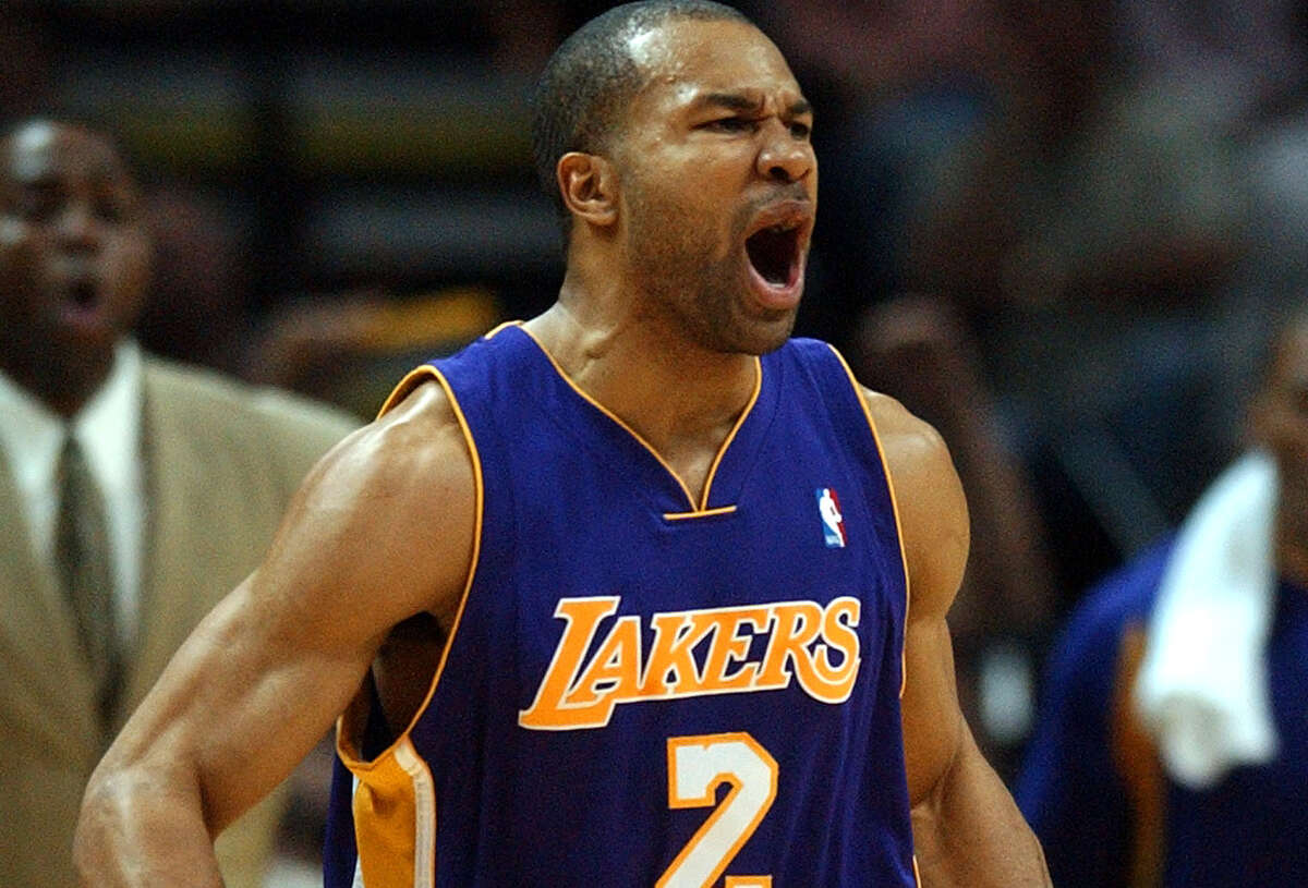 Lakers’ Derek Fisher reacts to a big shot in the second quarter of Game 5 of the Western Conference semifinals in 2004.