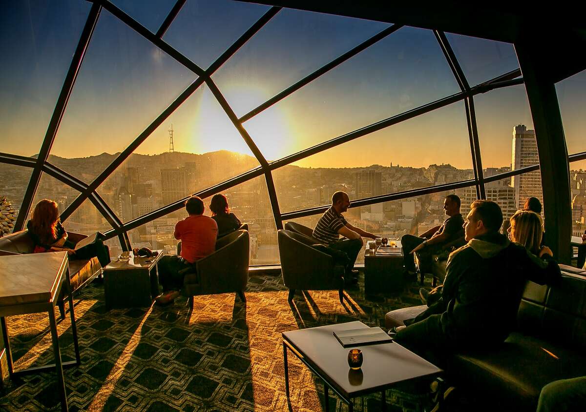 People have drinks in the View Lounge at the Marriott Hotel in San Francisco, Calif. on Saturday, November 28th, 2015.