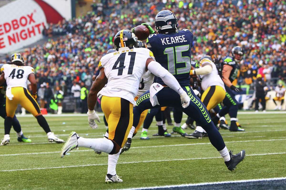 Seahawks' Jermaine Kearse (15) catches a 12-yard pass to score as Steelers' Antwon Blake (41) defends in the second quarter of Seattle's game against Pittsburgh, Sunday, Nov. 29, 2015.