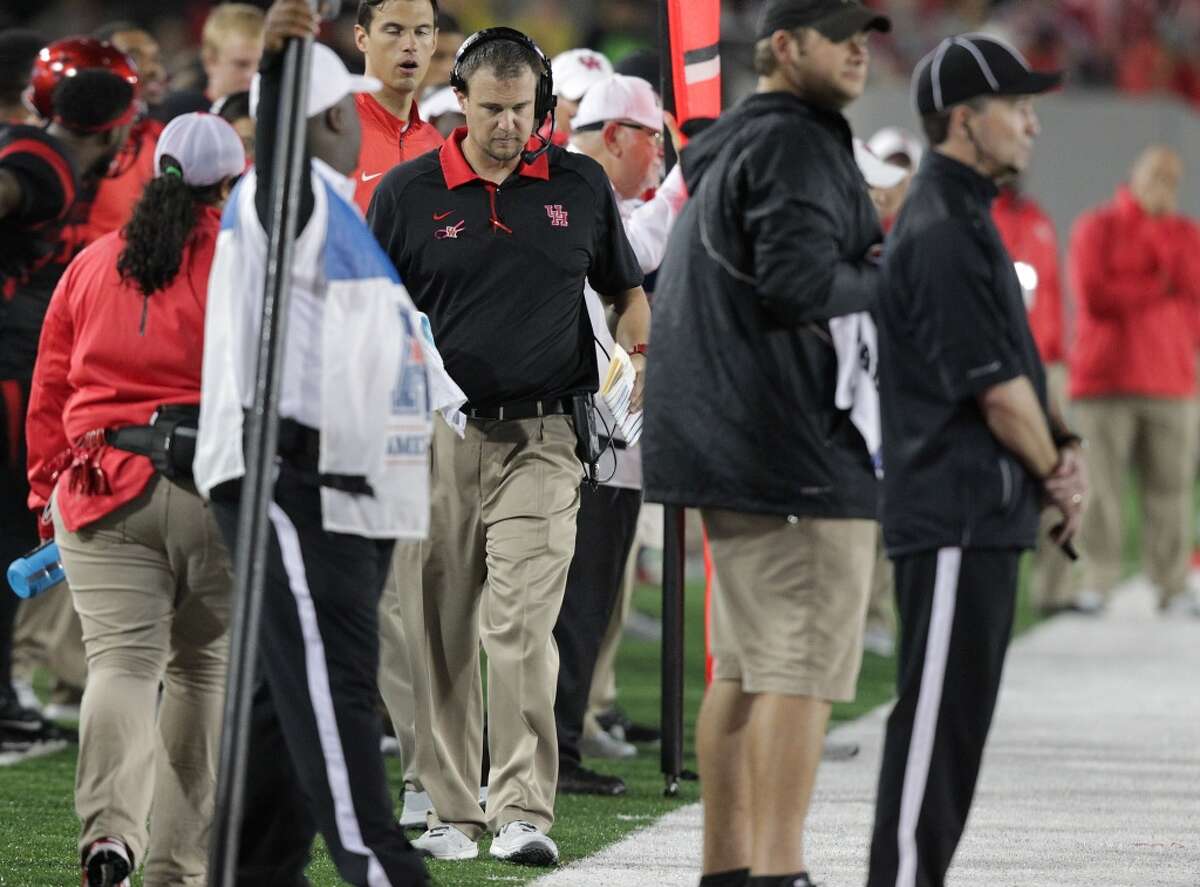 Houston Cougars head coach Tom Herman walks the sidelines in the second half of game action against Vanderbilt on Saturday, Oct. 31, 2015, in Houston. Houston won the game 34-0. ( Elizabeth Conley / Houston Chronicle )