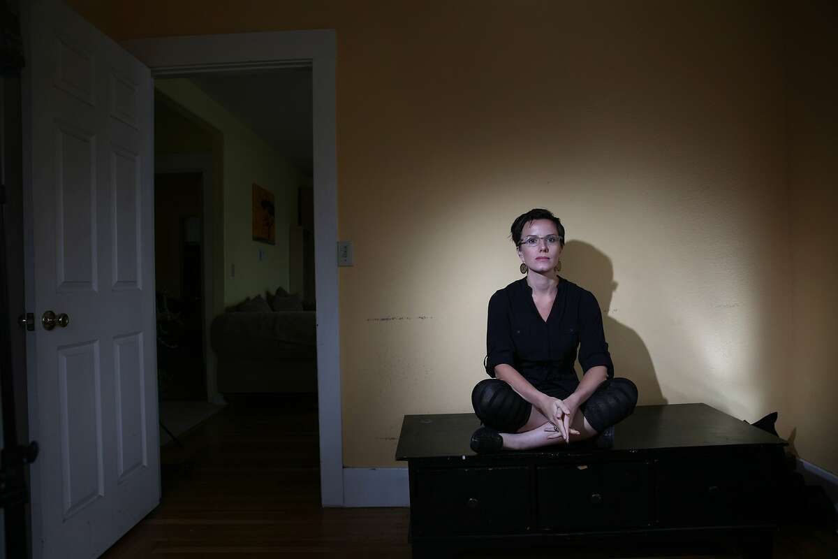 Sarah Shourd, of Oakland, sits for a portrait in her home on Monday, November 30, 2015 in Oakland, Calif.