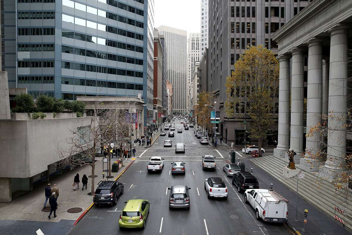 Traffic on Battery Street toward Market Street in San Francisco, California, on Monday, Nov. 30, 2015.