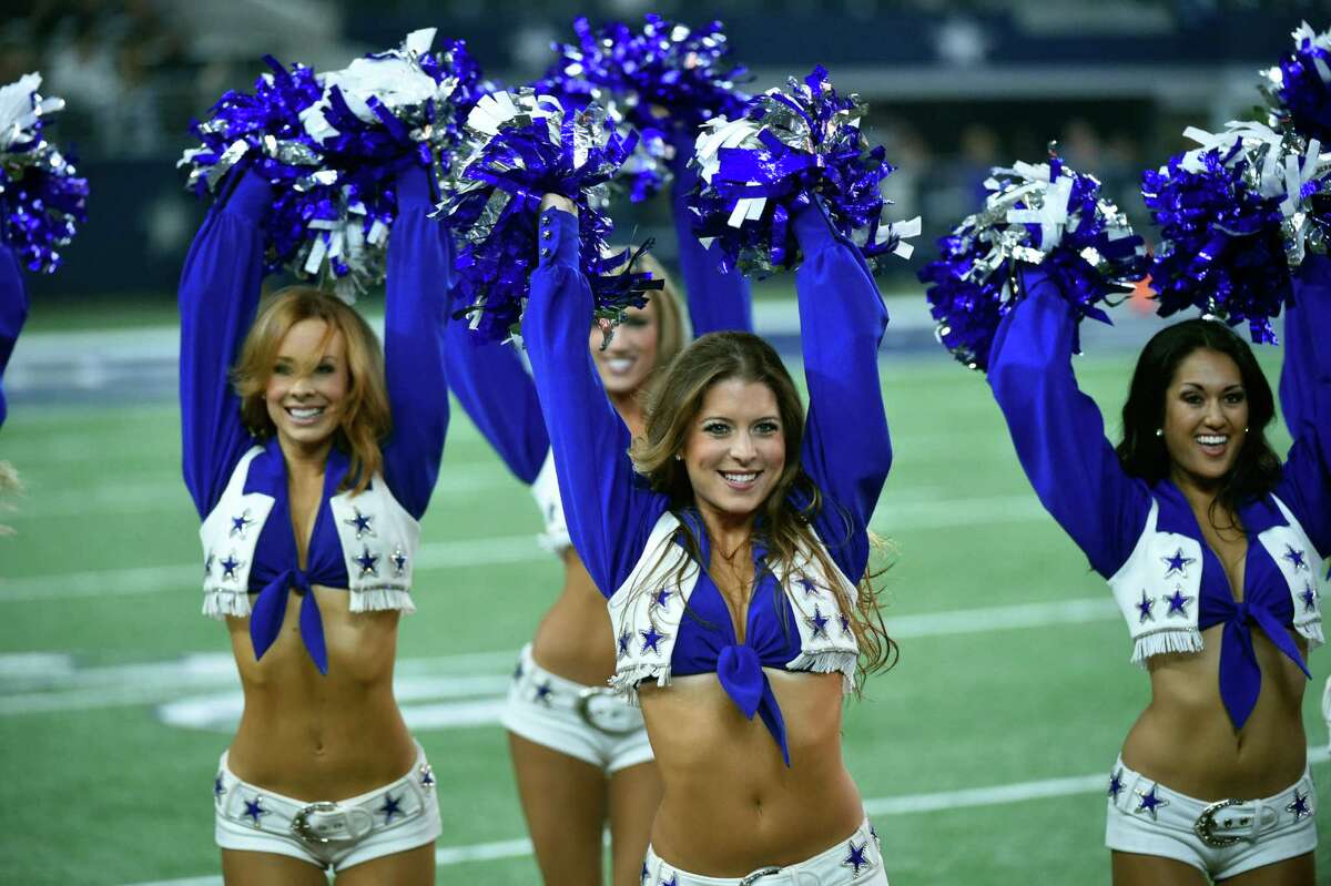 The Dallas Cowboys Cheerleaders perform during the Luke Bryan Salvation Army Red Kettle Kickoff Concert at halftime of an NFL football game between the Carolina Panthers and the Dallas Cowboys, Thursday, Nov. 26, 2015, in Arlington, Texas. (AP Photo/Michael Ainsworth)