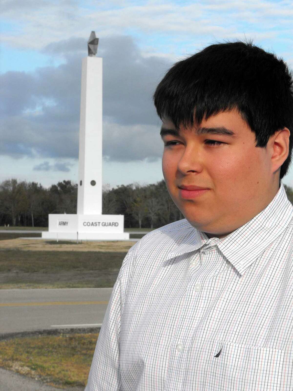 Seven Lakes High School's Carlos Vargas is one of two winners of the Katy Rotary Club's "What 9/11 Means to Our Country" essay contest, organized as part of the dedication of Freedom Tower in Freedom Park.