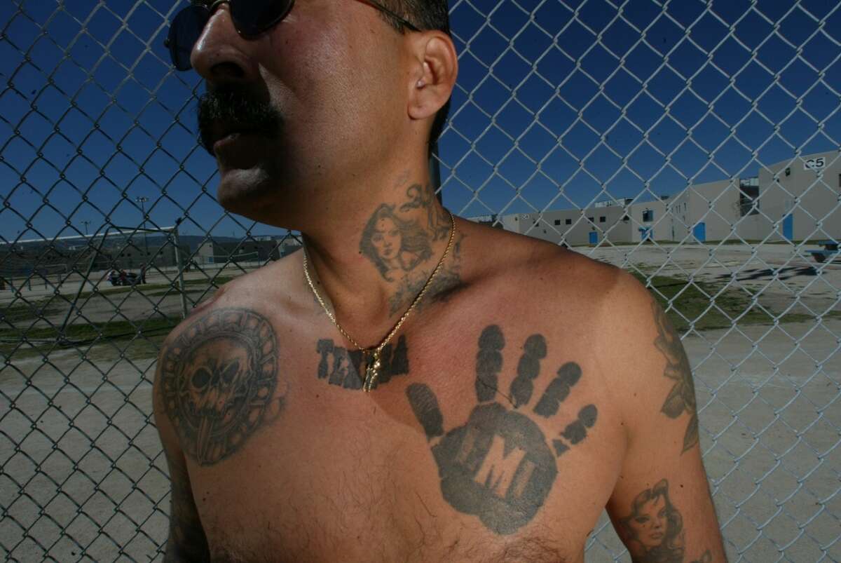 Black hand of the Mexican Mafia Nicknamed the "black hand of death" according to former gangster Rene Enriquez, this tattoo is an identifier for members of the Mexican Mafia. Enriquez told NPR in 2008 that the Mexican Mafia was one of the most influential gangs of California, having infiltrated nearly every prison in the state. 