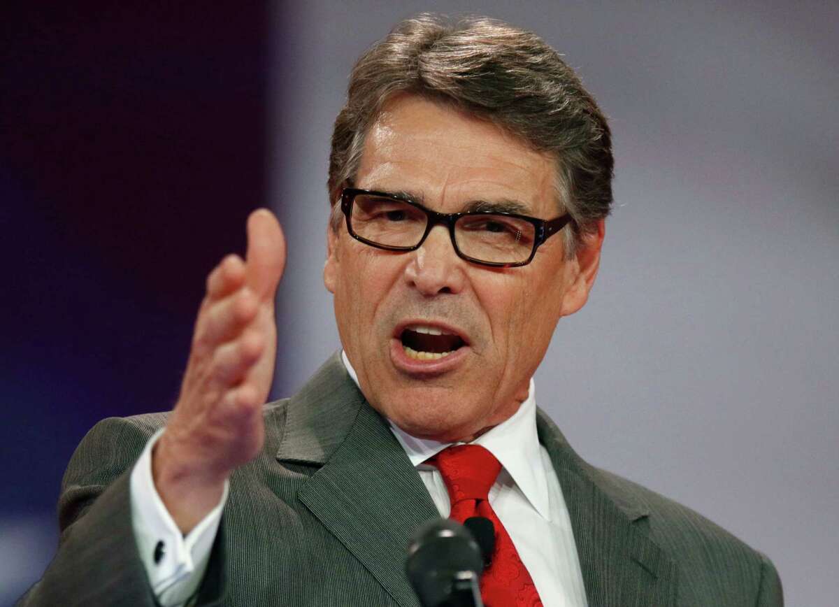 FILE - In this Aug. 22, 2015, file photo Republican presidential candidate, former Texas Gov. Rick Perry speaks in Columbus, Ohio. Former Gov. Rick Perry hasn't tipped his hand on a presidential endorsement since ending his own White House race, but he is dipping back into Texas politics. (AP Photo/Paul Vernon, File)