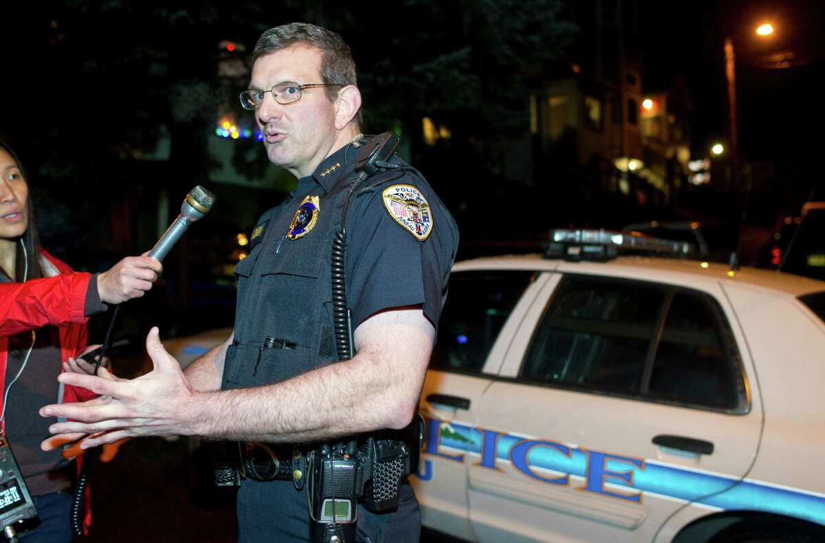 In this photo taken Monday night, Nov. 30, 2015, Juneau Police Chief Bryce Johnson speaks to reporters about the death of Mayor Stephen "Greg" Fisk in Juneau, Alaska. Fisk, the newly elected mayor of Alaska's capital city, was found dead in his home Monday. Circumstances surrounding the death were not immediately known. (Michael Penn/The Juneau Empire via AP) MANDATORY CREDIT