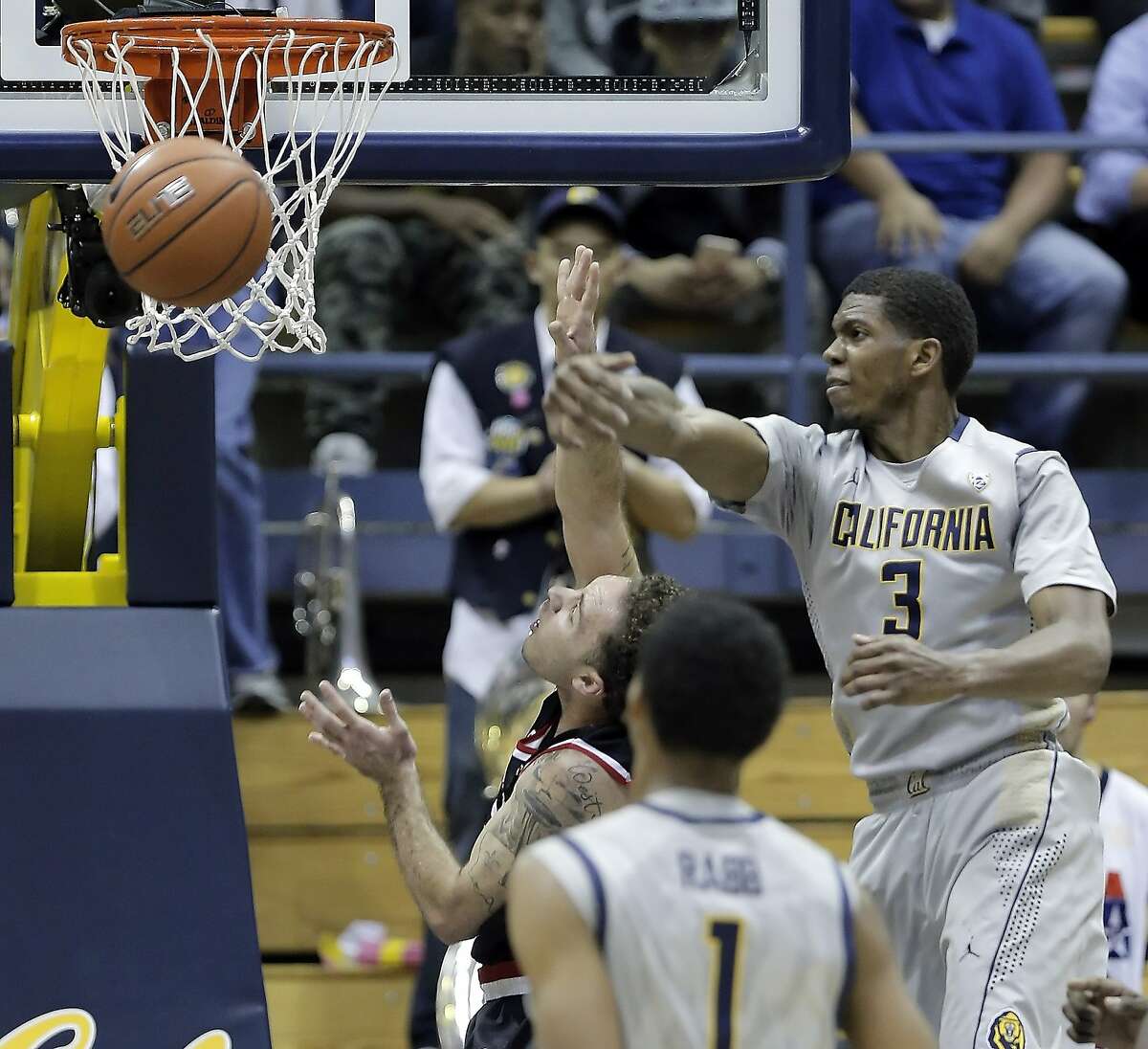 Tyrone Wallace (3) blocks a shot by Malik Montoya (2) in the second half as the Cal Bears played the Seattle University Redhawks at Haas Pavilion in Berkeley, Calif., on Tuesday, December 1, 2015. Cal won 66-52.