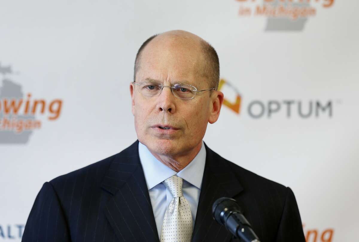 FILE - In this April 29, 2014 file photo, Stephen Hemsley, president and CEO of UnitedHealth Group, announces 75 jobs are being created within the company's subsidiary, Optum, which works in health care services and technology support, in Southfield, Mich. Hemsley offered a mea culpa Tuesday, Dec. 1, 2015 for his company's decision to dive deeper into the Affordable Care Act's public insurance exchanges, a move that ultimately forced the nation's largest health insurer to cut its earnings forecast. (AP Photo)