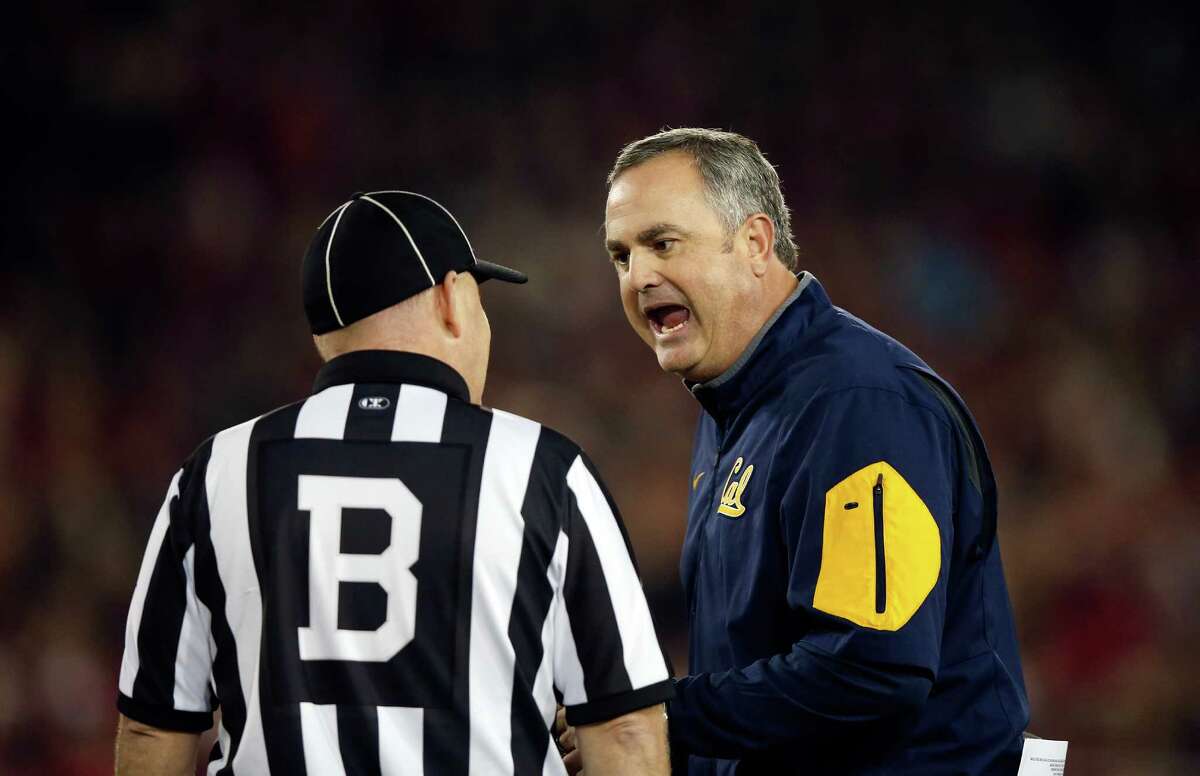 PALO ALTO, CA - NOVEMBER 21: Head coach Sonny Dykes of the California Golden Bears argues with back judge Joe Johnston during their game against the Stanford Cardinal at Stanford Stadium on November 21, 2015 in Palo Alto, California. (Photo by Ezra Shaw/Getty Images)