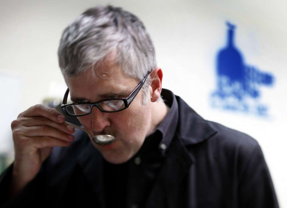 James Freeman tastes samples of coffee beans at his Blue Bottle Coffee Co. roasting plant in Emeryville, Calif., on Tuesday, June 30, 2009.