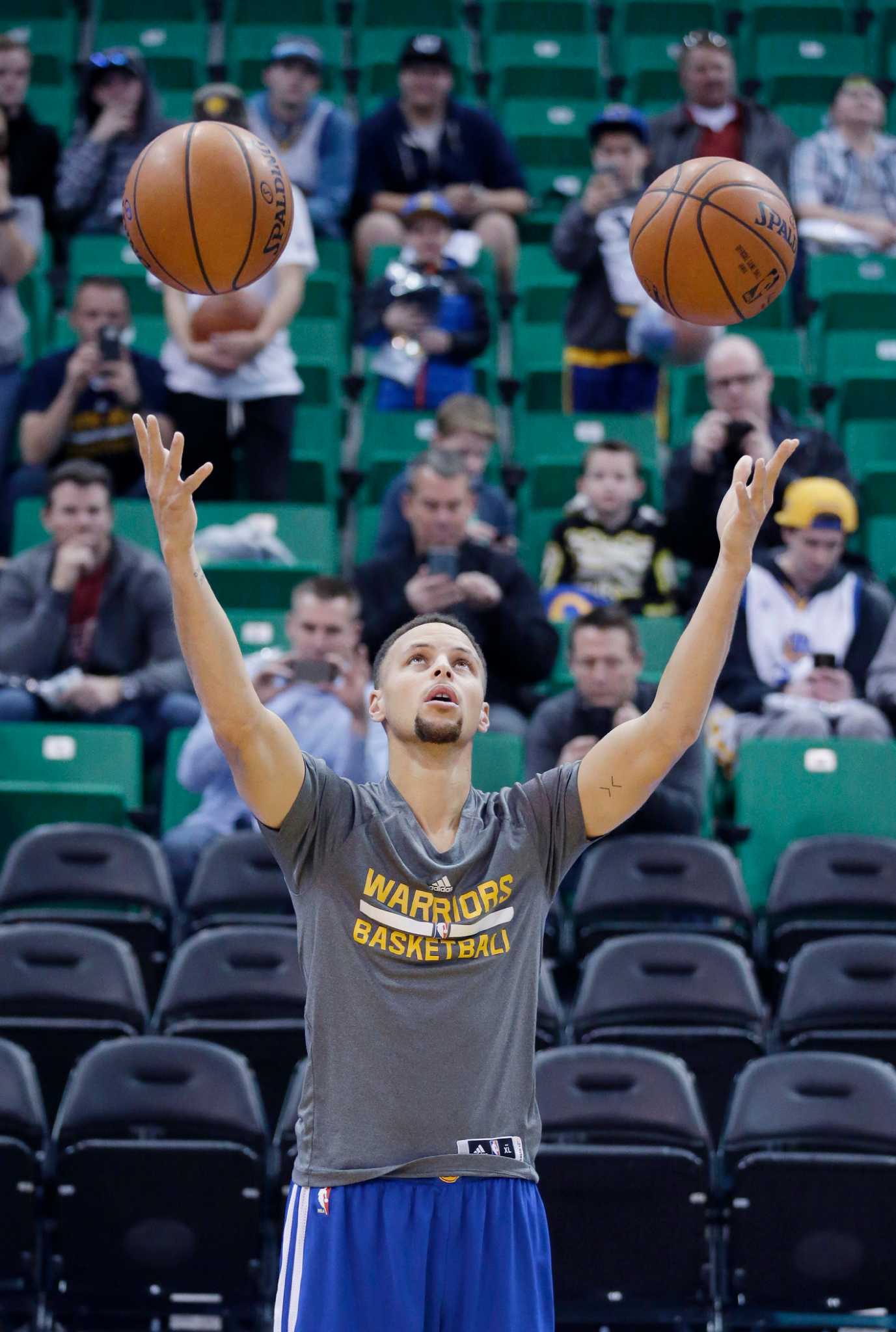 Stephen Curry of the Golden State Warriors warms up prior to Game