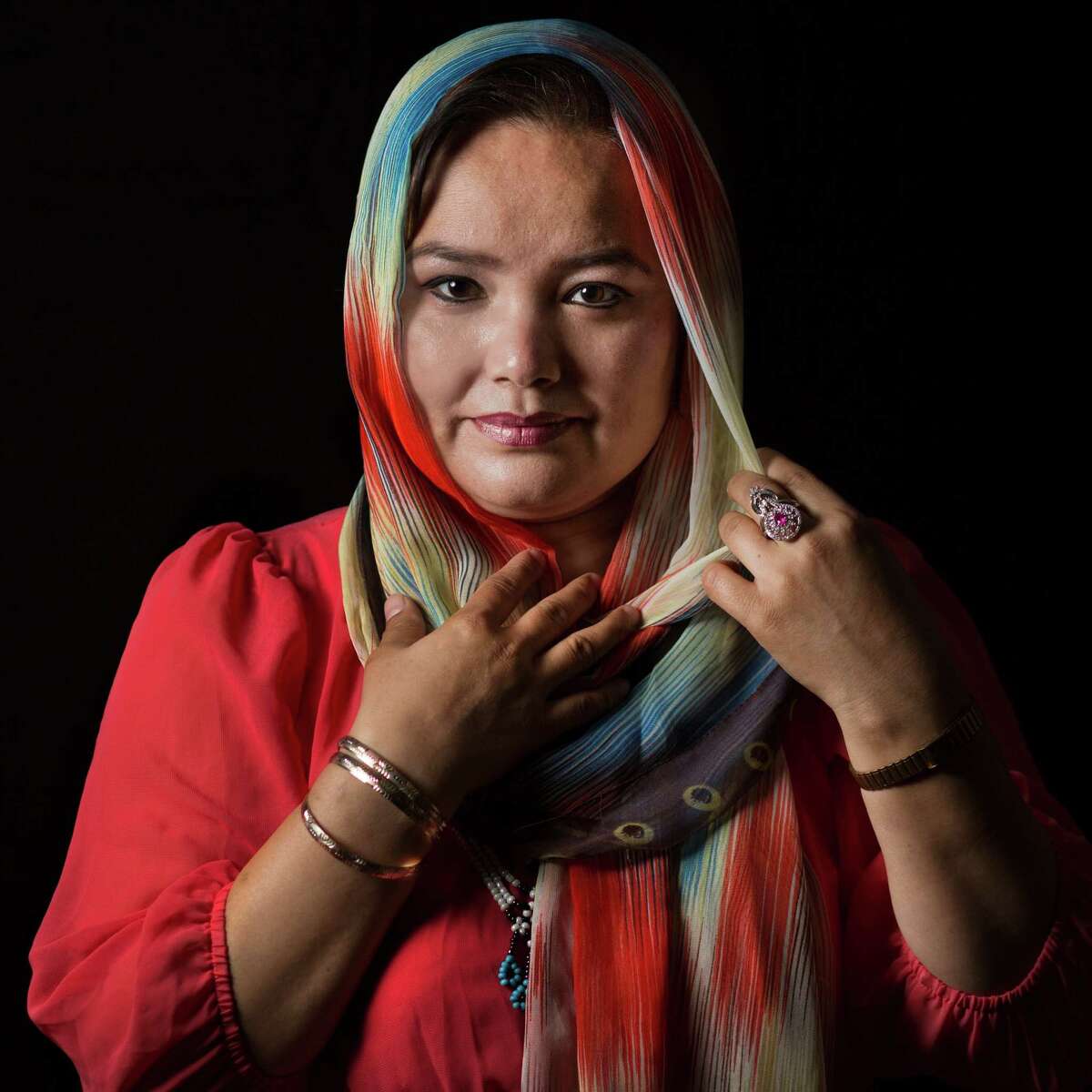Khatera Khorushan, 38, a refugee from Afghanistan made sure to bring her diplomas and degrees when she moved to the United States. Saturday, Sept. 12, 2015, in Houston.