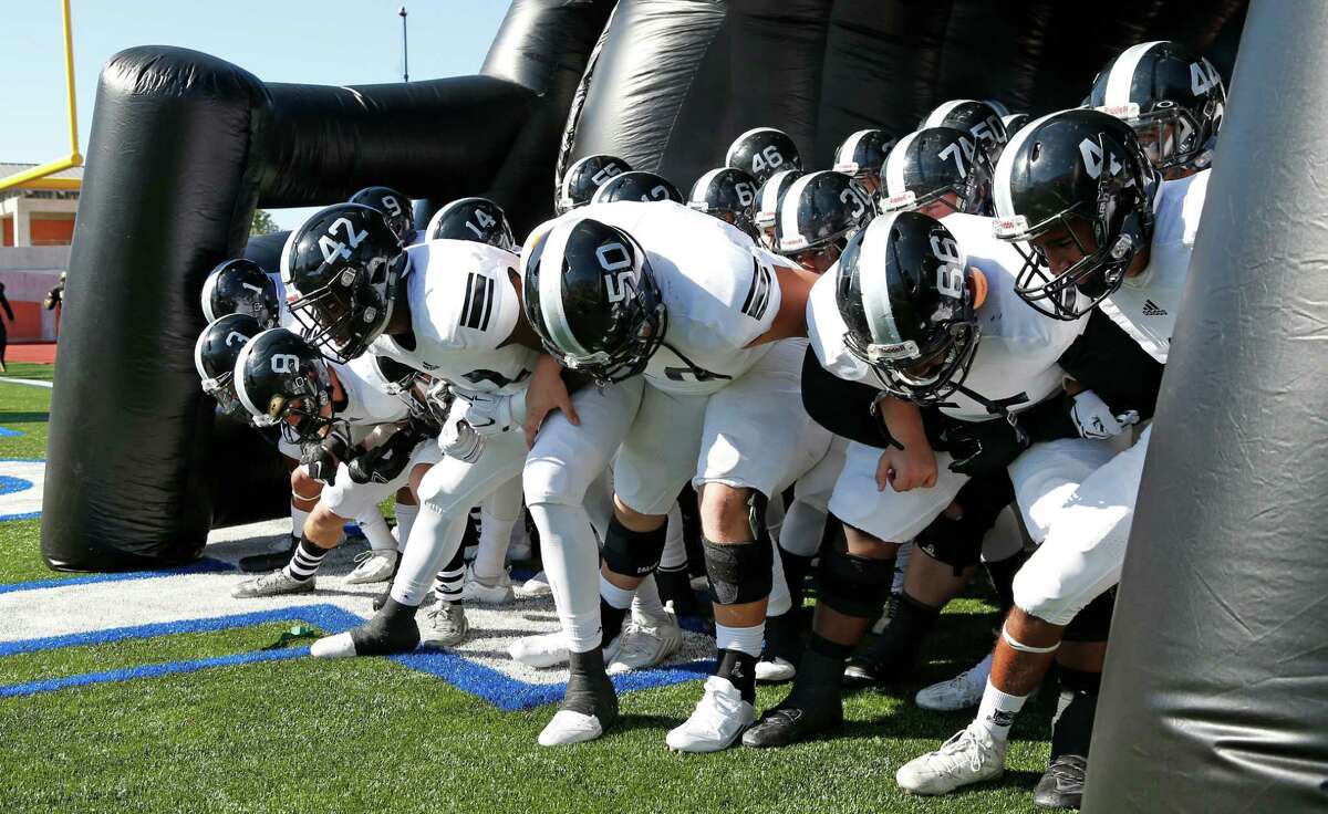 Steele football goes thru their routine before entering the field in the Class 6A Division II second-round high school football game at Heroes Stadium on Nov. 22, 2015
