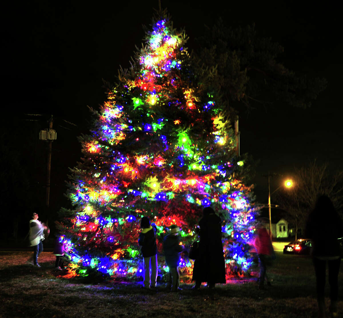 The city of Trumbull held its annual Christmas Tree Lighting at the Town Hall Gazebo in Trumbull, Conn. on Friday Dec. 4, 2015. While waiting for the trees to be lit, residents were treated to Christmas songs performed by the Madison Middle School's band. To cap off the celebration, Santa Claus arrived on a fire truck decorated with thousands of Christmas lights. After arriving Santa greeted kids and gave out candy canes.