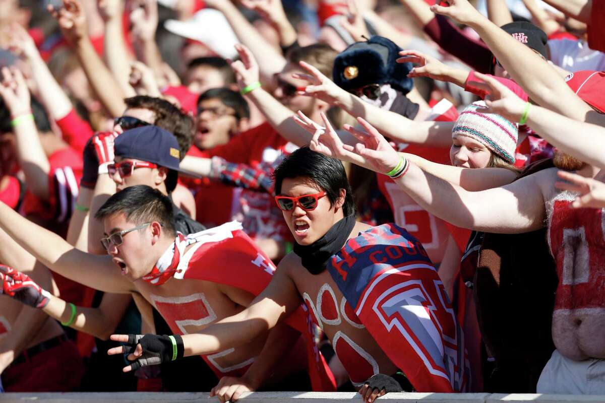 Houston Cougars fans chant during the third quarter of the American Athletic Conference Championship football game at TDECU Stadium on Saturday, Dec. 5, 2015, in Houston .