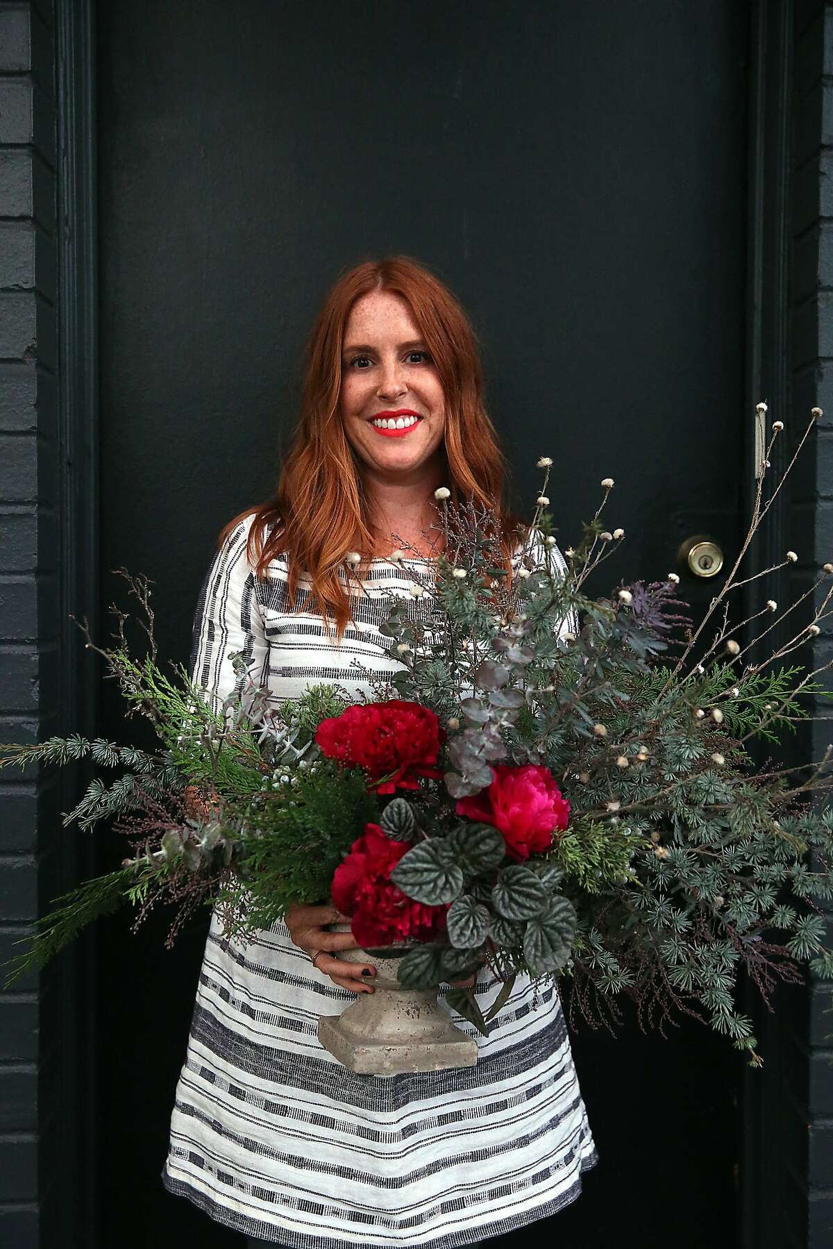 Designer Natalie Brookshire shows one of her arrangements in San Francisco, California, on Friday, December 4, 2015.