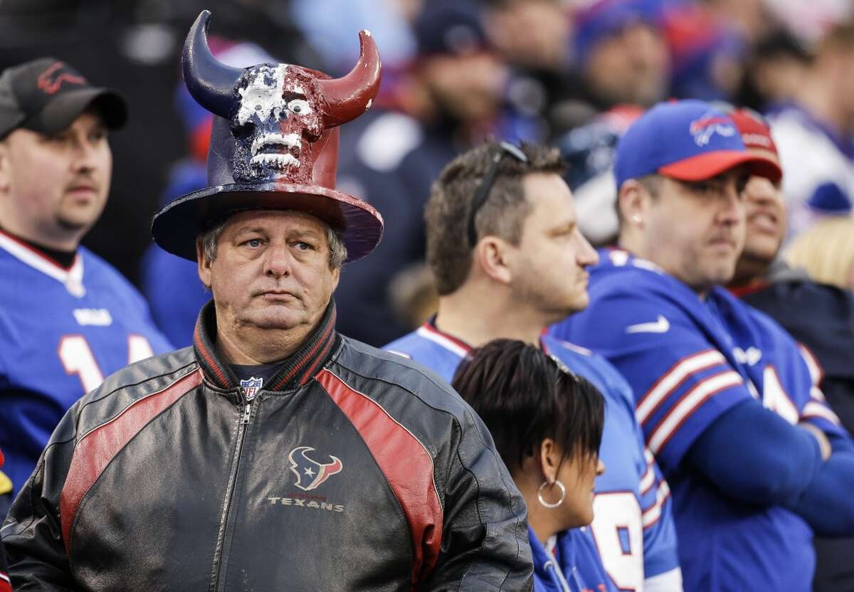 A Houston Texans fan watches as time runs out in the fourth quarter of an NFL football game against the Buffalo Bills at Ralph Wilson Stadium on Sunday, Dec. 6, 2015, in Orchard Park, N.Y. ( Brett Coomer / Houston Chronicle )
