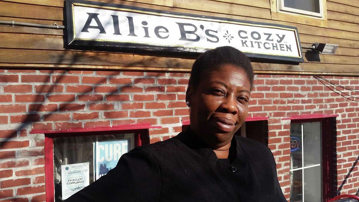Kizzy Williams, owner of Allie B's Cozy Kitchen, a restaurant in the West Hill section of Albany, gave away 130 meals on Thanksgiving. (Chris Churchill / Times Union)