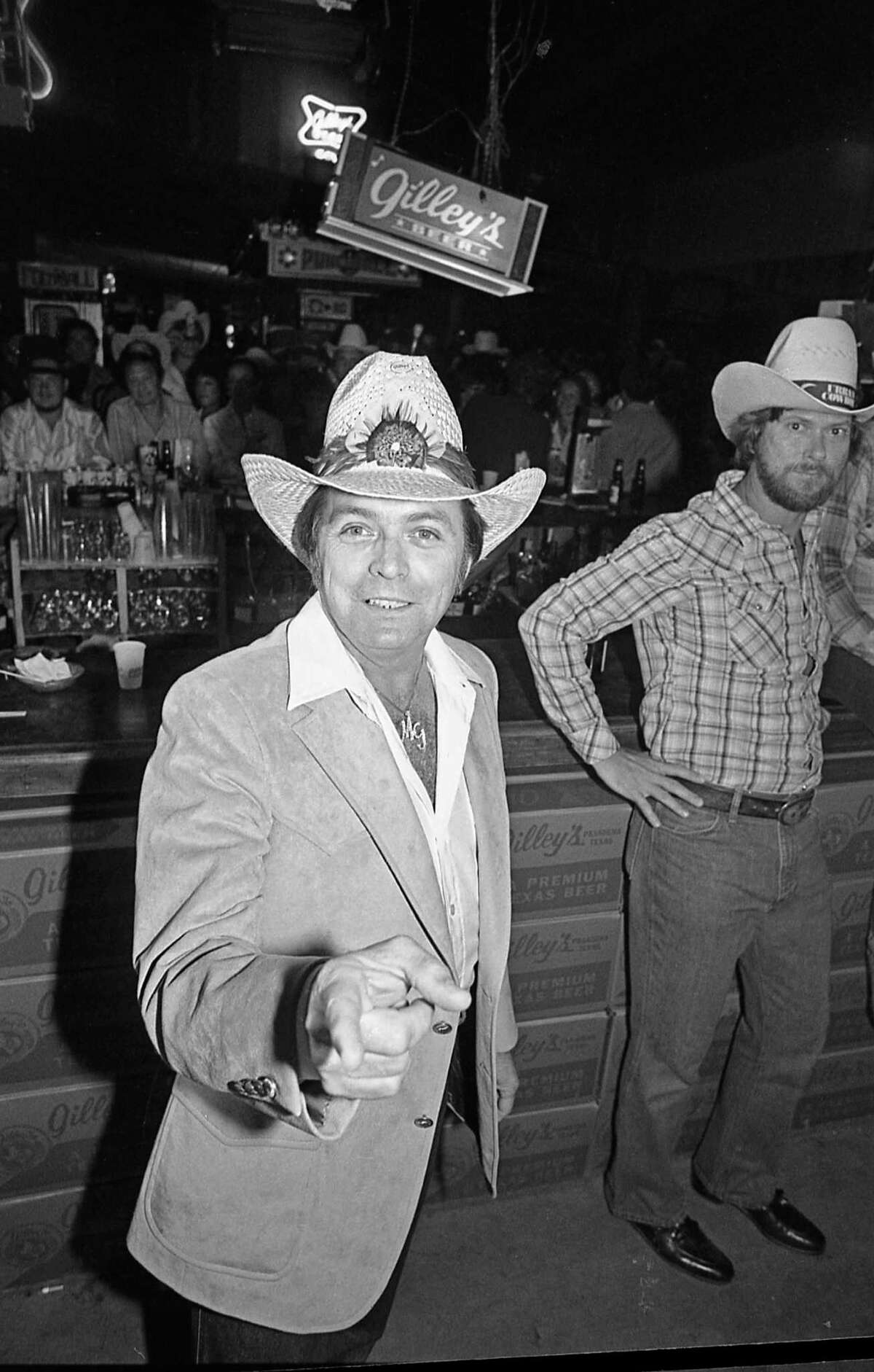06/05/1980 - Mickey Gilley at Houston movie premiere party for "Urban Cowboy" at Gilley's club.