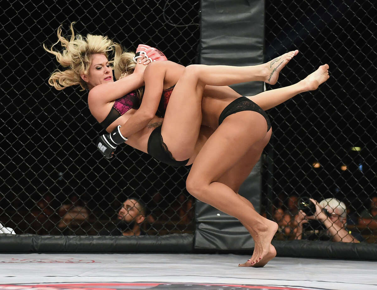 LAS VEGAS, NV - AUGUST 08: Fighters Teri "Feisty Fists" London (L) and Lauren "The Animal" Erickson compete during "Lingerie Fighting Championships 20: A Midsummer Night's Dream" at The Joint inside the Hard Rock Hotel & Casino on August 8, 2015 in Las Vegas, Nevada. London won the bout.