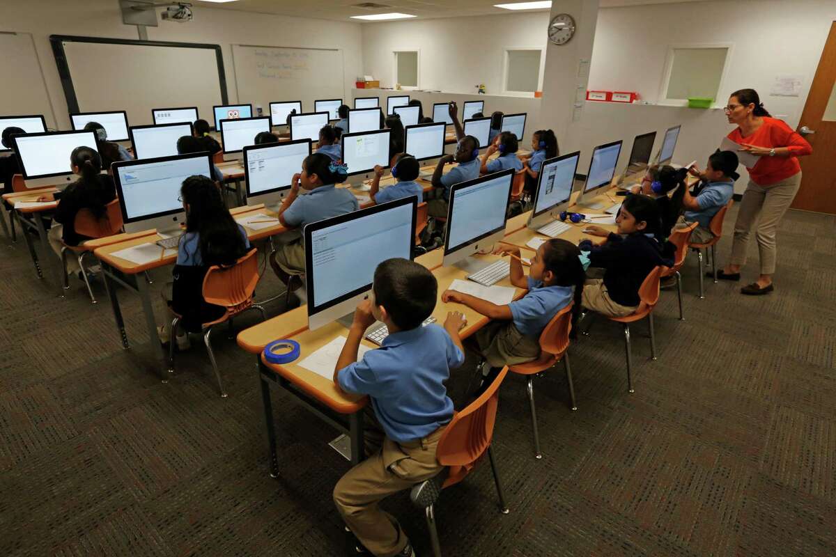 Kipp students work in the computer lab Tuesday, Sept. 15, 2015, in Houston.  ( Steve Gonzales / Houston Chronicle )