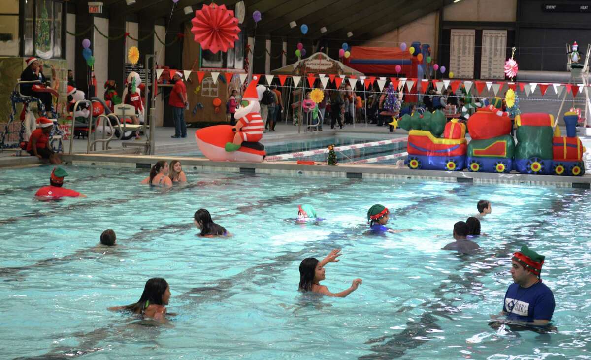 "Swim With the Elves" is a holiday event at San Antonio Natatorium from the city's Parks and Receation Dept. The pool boasts 4.5-star Yelp rating. 