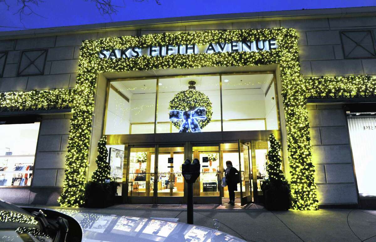 Seen here at night, Saks Fifth Avenue at 205 Greenwich Avenue was selected as one of the winners. in the Greenwich Chamber of Commerce Storefronts Holiday Window Contest.