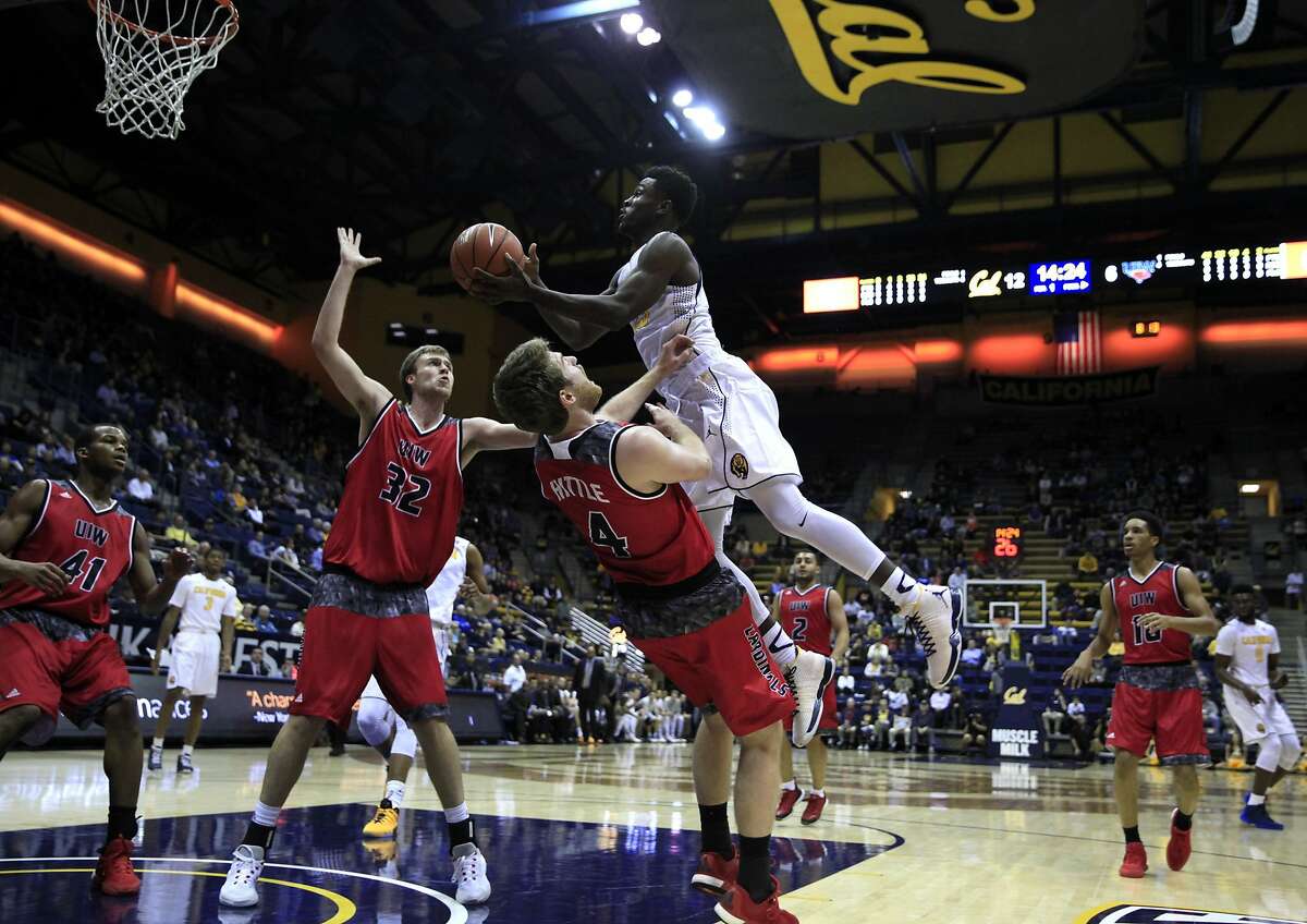 Jabari Bird jumps over Kyle Hittle going for a layup during a game at Haas Pavilion between the Cal Bears and Incarnate Word in Berkeley, California, on Wednesday, Dec. 9, 2015.