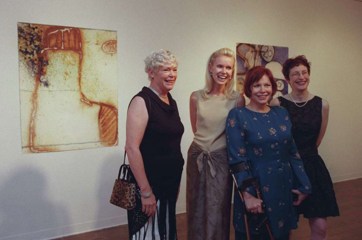 The late Jane Dale Owen, in blue, was honored during a 2000 Blaffer Art Museum gala. She posed with Suzanne Dungan, from left, Terrell Eastman Wilson, and then-director Terrie Sultan. 