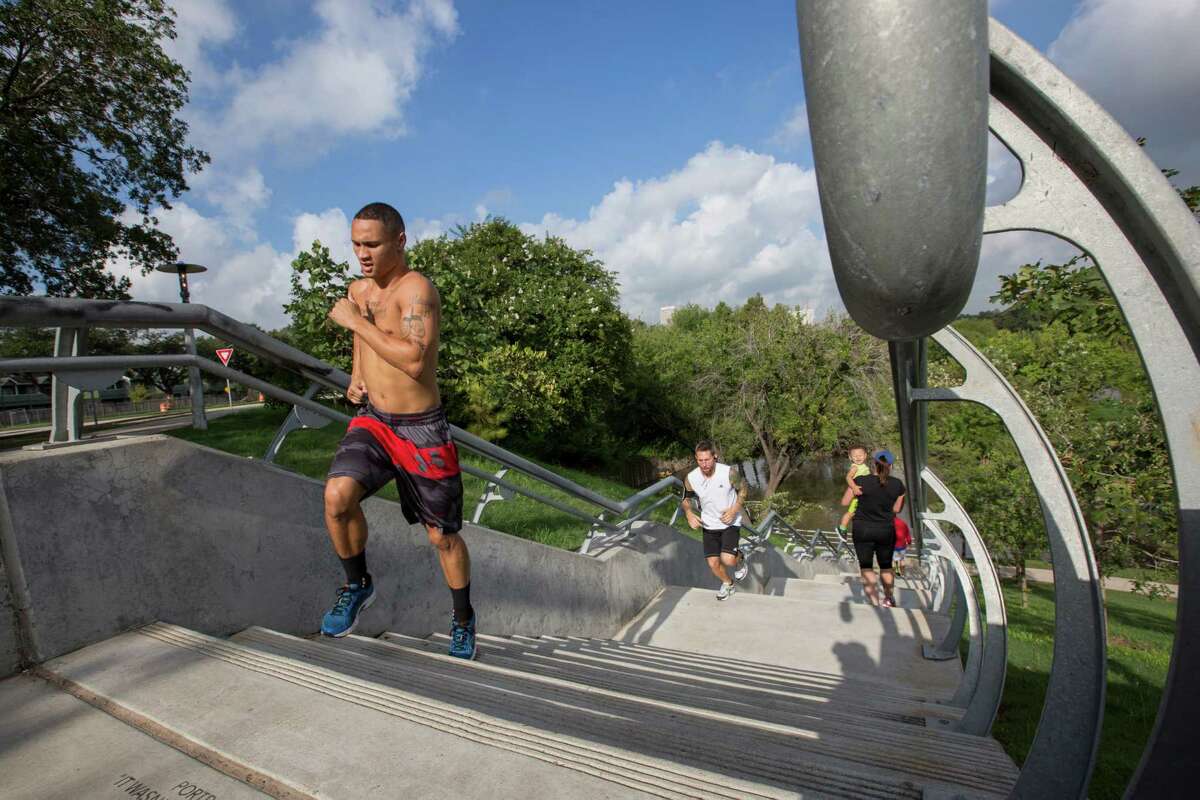 Unbeaten welterweight Regis Prograis stays in fighting shape by scaling steps during a workout with a group of fellow boxers at Buffalo Bayou Park.