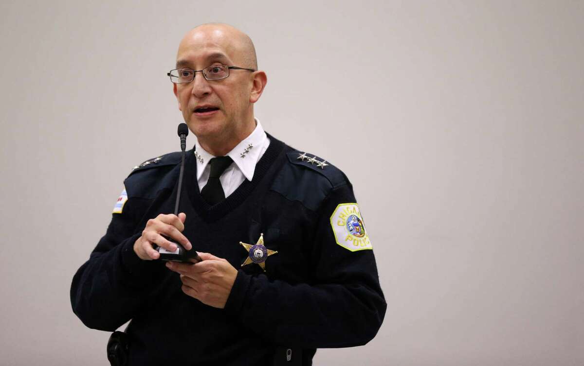 In this photo taken Wednesday, Dec. 9, 2015, Chicago Police Department Interim Superintendent John Escalante speaks during a monthly board meeting at CPD Headquarters where people protesting the Laquan McDonald killing and other Chicago police abuse gathered to voice their views in Chicago. Many activists and analysts say the steps Mayor Rahm Emanuel is taking to hold Chicago police officers accountable for abuses are way too timid. It's tinkering at the edges of deeply flawed structures or merely switching around managers, they argue, when what's needed is to scrap the entire system and start all over. (Chris Sweda/Chicago Tribune via AP) ORG XMIT: ILCHT203
