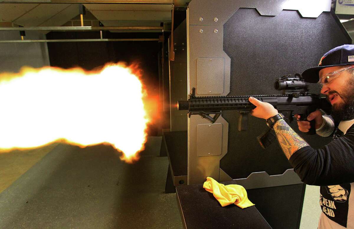 Craig Hlavaty shoots an MK47 at the Liberty Armory, the only gun range inside the 610 Loop, Thursday, Dec. 10, 2015, in Houston.